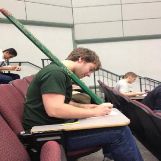 Huge Pencil During An Exam